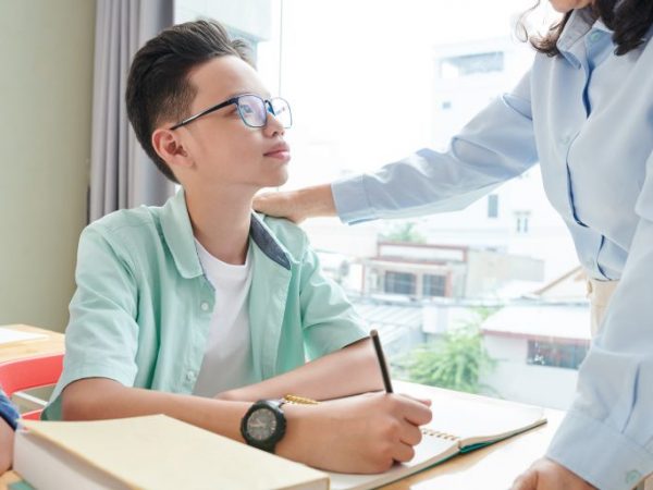 teacher praising schoolboy 2021 08 28 21 59 42 utc 768x512 1 Explaining ABA Reinforcement